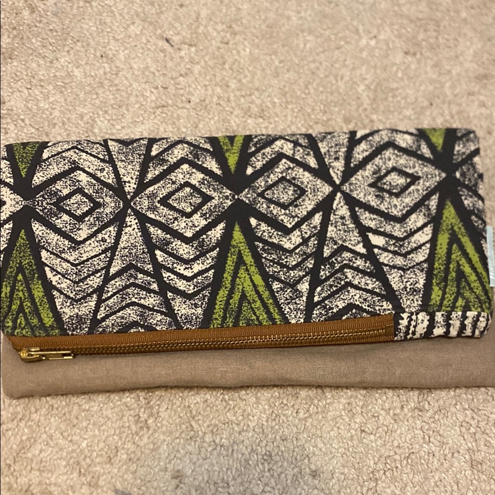 Geometric Pattern Clutch with Green Accents